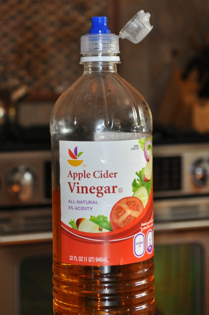 Use a water bottle cap to make vinegar easier to pour.